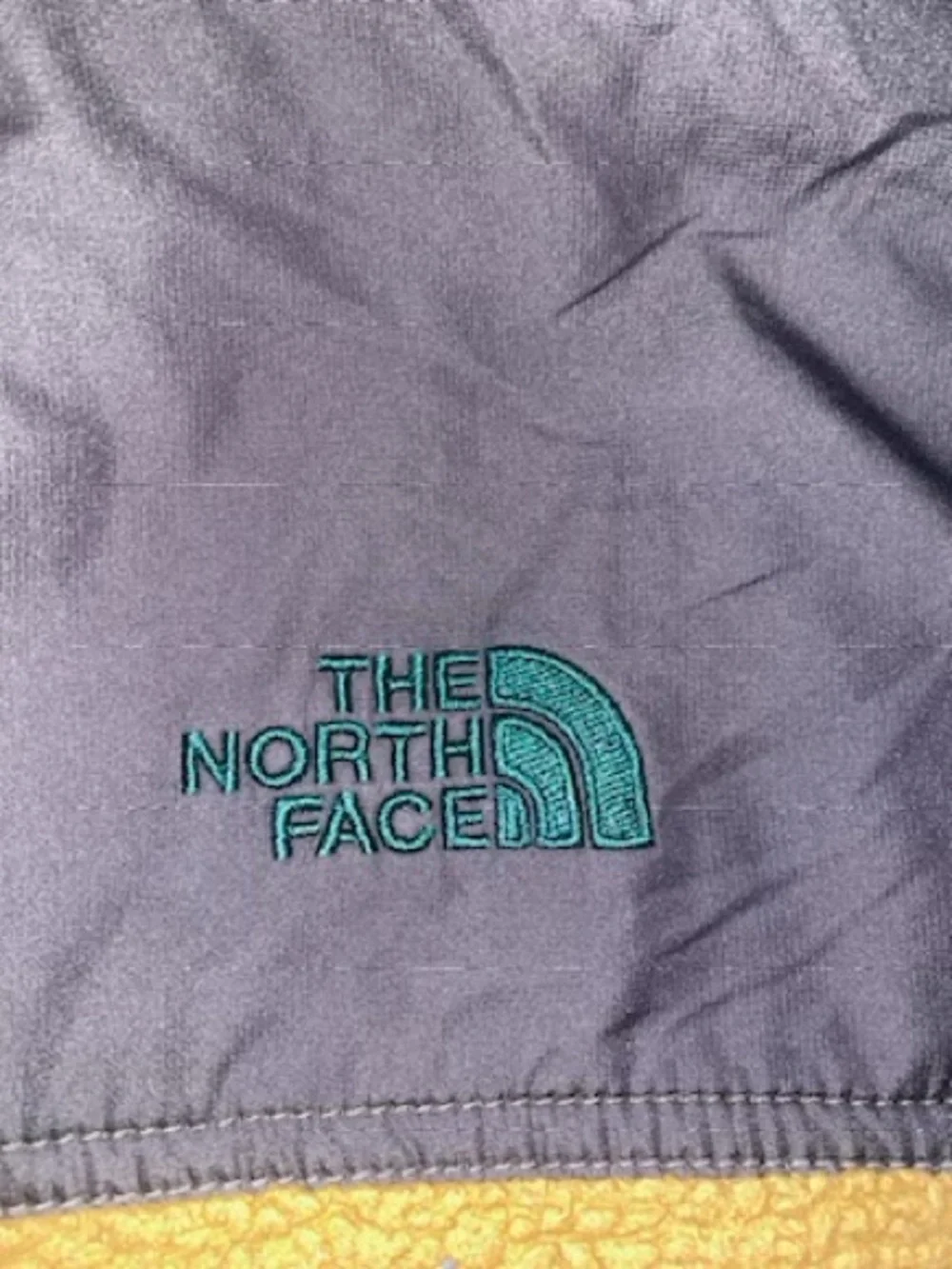 The North Face Men's Camel Sherpa Half-Zip Pullover with Navy Pocket Accents